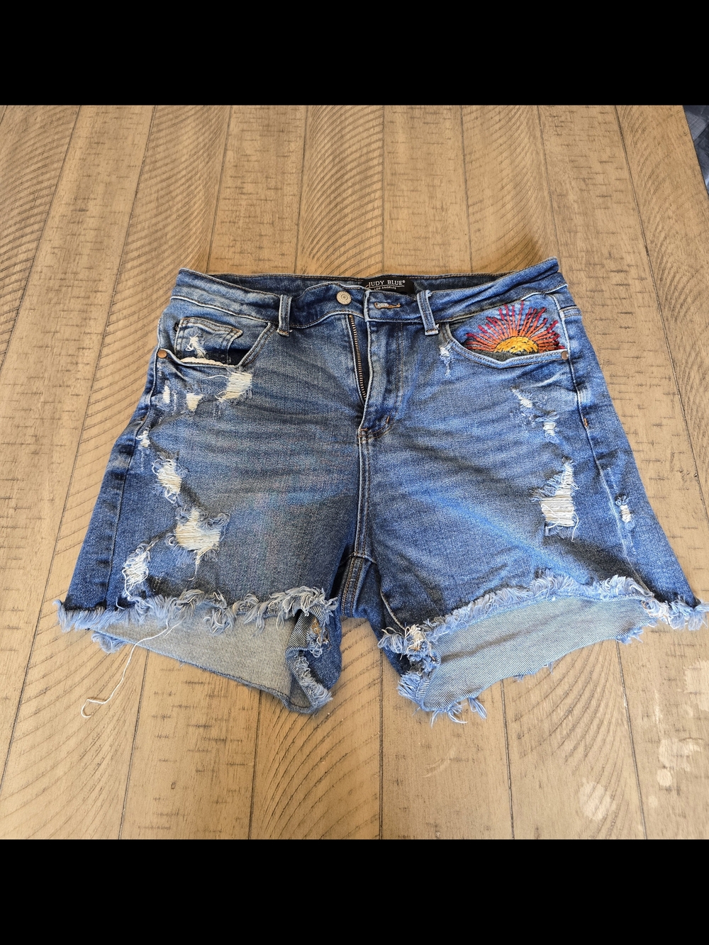 Judy Blue Blue Distressed Denim Shorts with Colorful Sun Embroidery